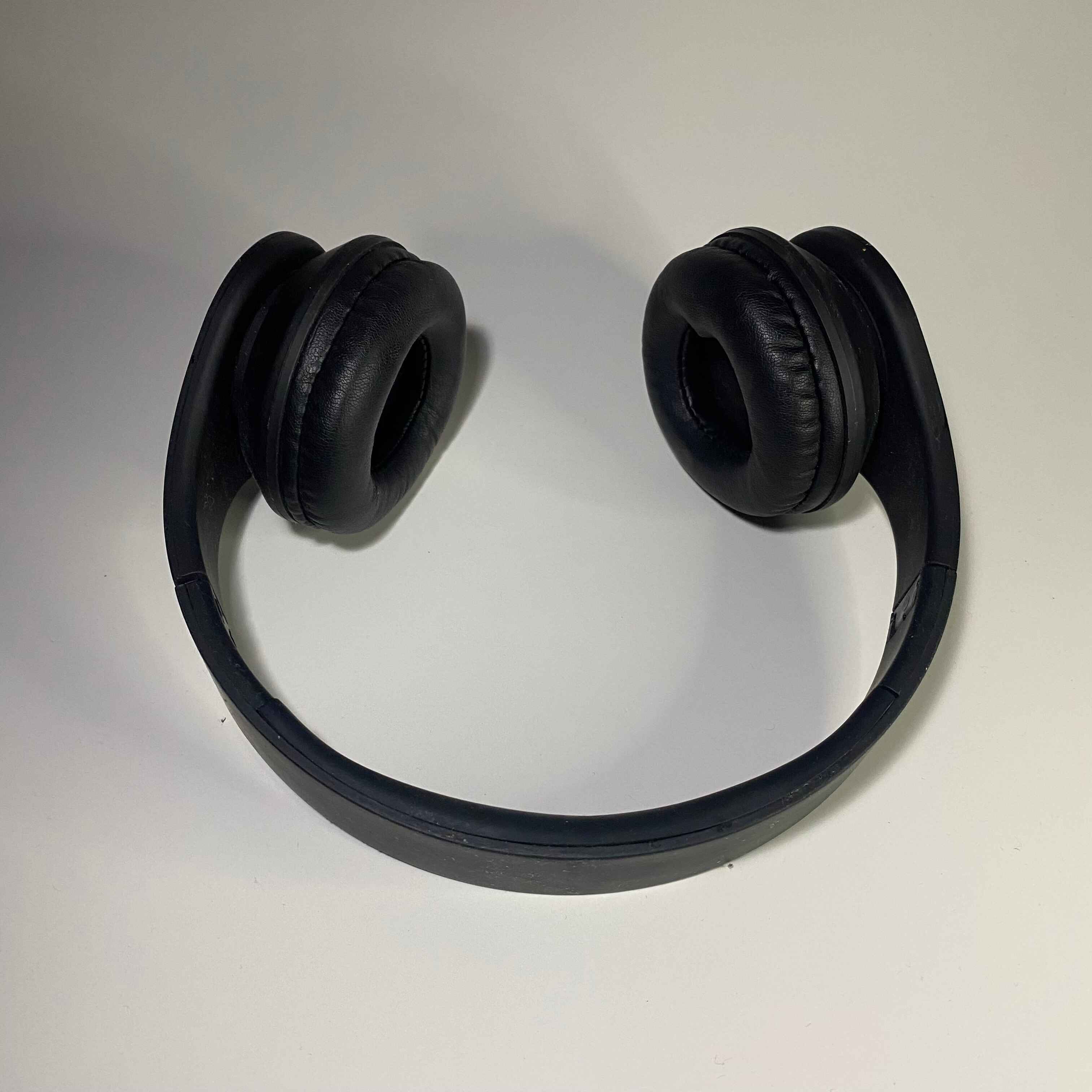 Front view of my sister's coffee mug, with the handle on its side